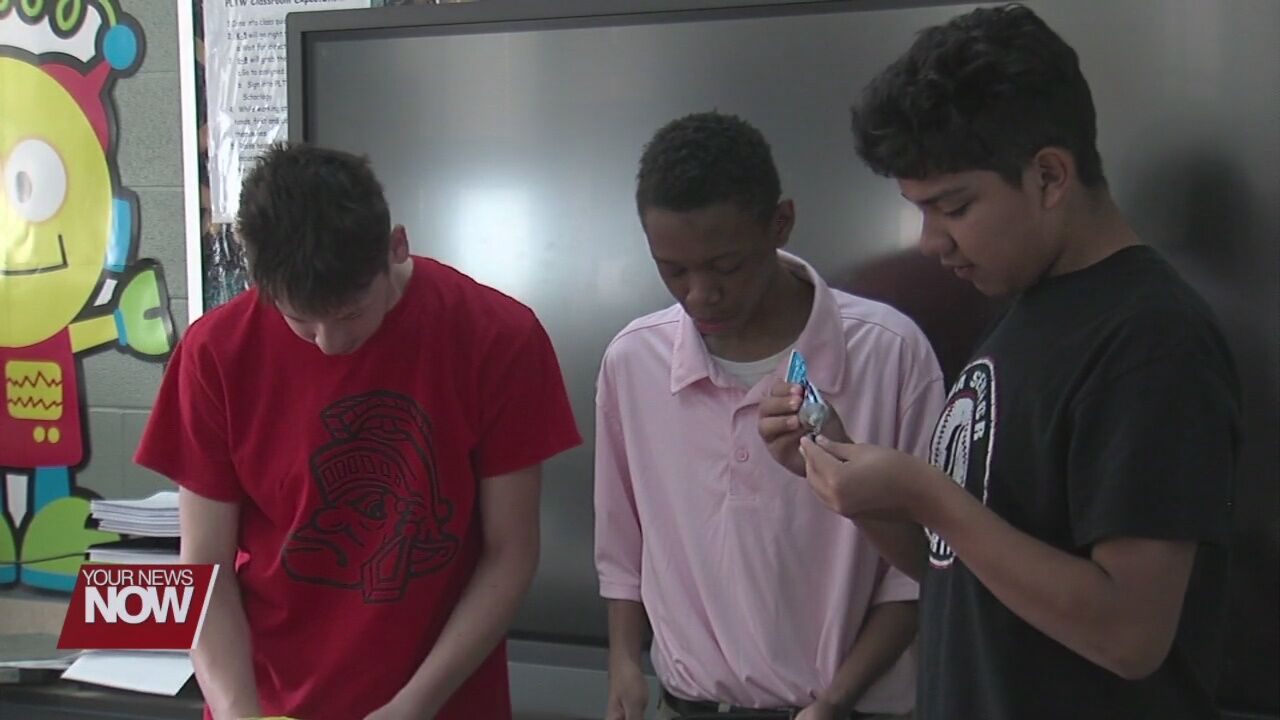 Lima students recycle old computer parts to make unique art